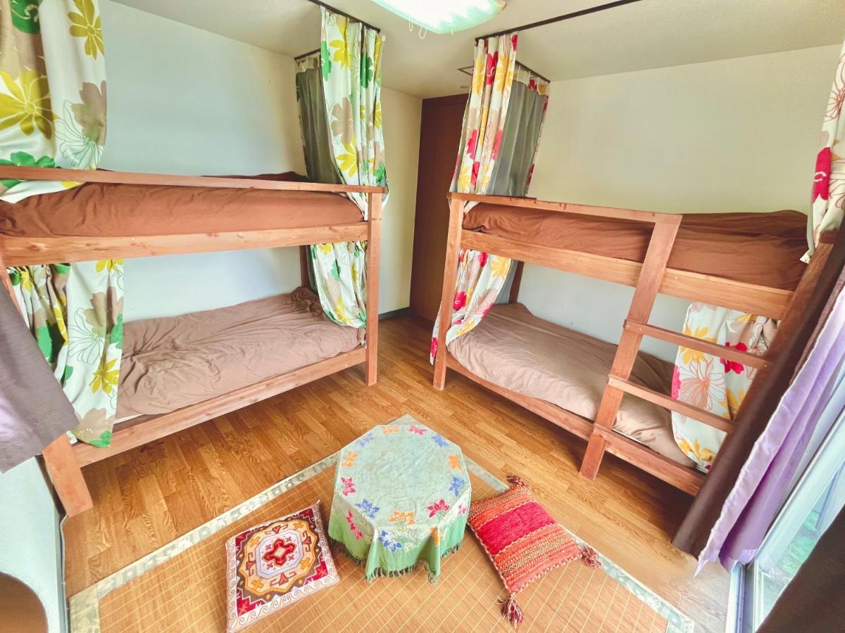 Guest House Waraemon Nago Exterior photo